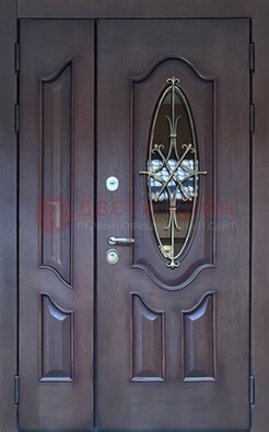 Темная металлическая дверь Винорит со стеклом и ковкой ДСК-239 в Звенигороде