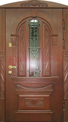 Узорная железная дверь массив со стеклом и ковкой ДСК-247 в Звенигороде