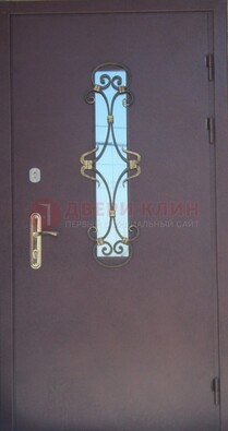 Металлическая дверь со стеклом и ковкой ДСК-77 в Звенигороде