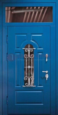 Синяя железная филенчатая дверь со стеклом и ковкой ДСК-97 в Звенигороде